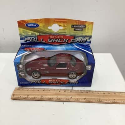 NIB Welly die cast pull back car Aston Martin 
