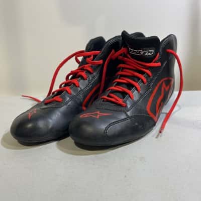 Mens Alpine Stars Motorcycle Boots with red Detailing.