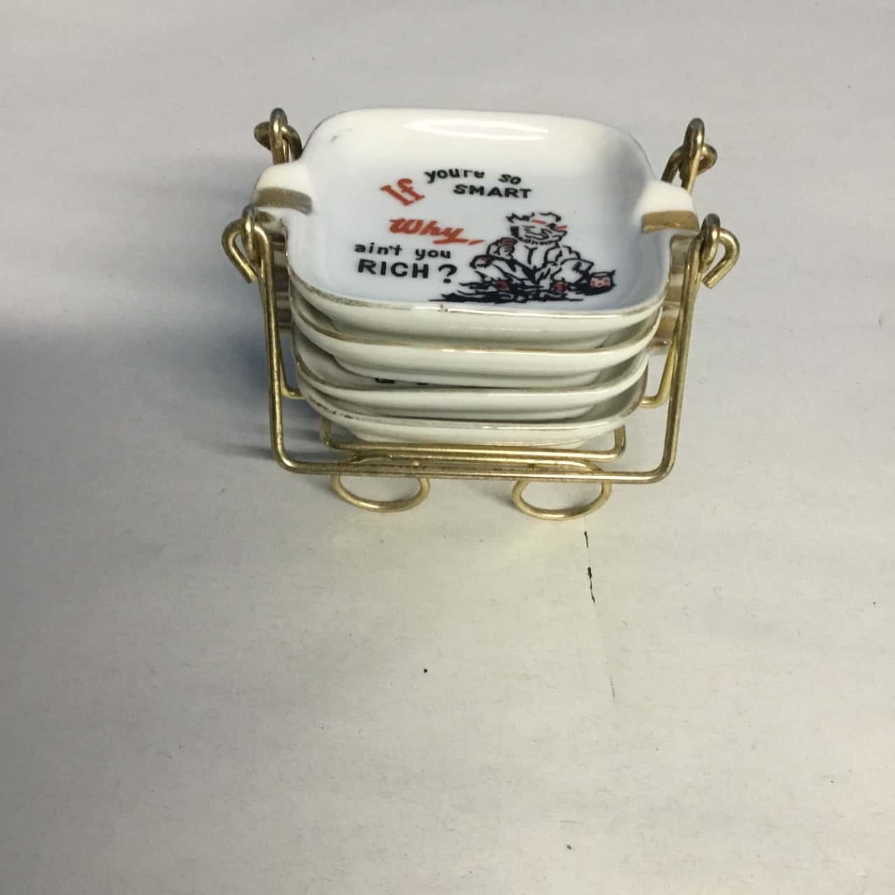 Vintage Souvenir ashtrays set of 4 (s)