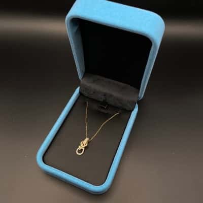  AGLAIA jewelry gold tone knot star Women's necklace