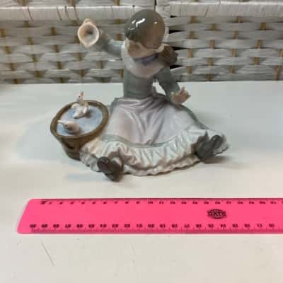 Nao Figurine Of A Girl Sitting On A Bench
