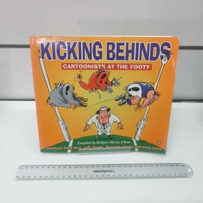 Kicking Behinds Cartoonists at the Footy Book