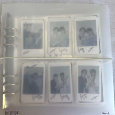 Collection of K-pop photocards, specifically styled as signed polaroids, organized within a specialized photocard binder. These specific photocards are from the 2022 Deling Magazine shoot.(B15)