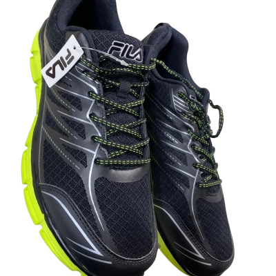 Size 12 Fila Evergrand TR 21.5 sneakers featuring a breathable mesh upper with vibrant neon yellow soles.