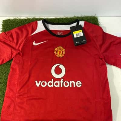 Nike MensManchester United  Size 26 jersey and shorts