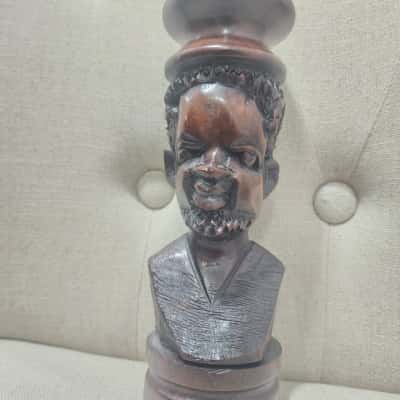 a vintage African hand-carved hardwood candlestick holder or figurine