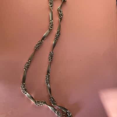 Emma Page silver necklace with bar and bead design