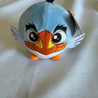 Disney The Lion King Squeezamals Zazu plush toy.  It is a soft and squishy collectible. The toy is blue with an orange beak and feet.(B14)