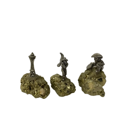 Set of 3 Figurines on top of Fool’s Gold Rock