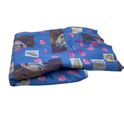 Synthetic retro 80's print fabric.  90 (w) x 150 (L) cm. 