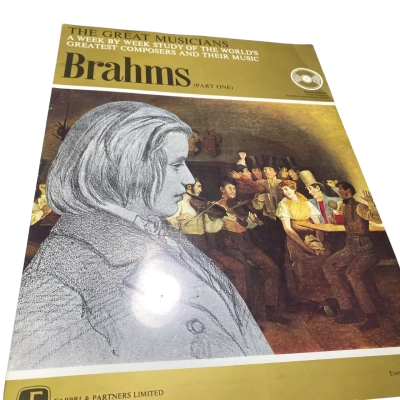 a vintage vinyl record and booklet set from "The Great Musicians" series, specifically covering the German composer Johannes Brahms. 