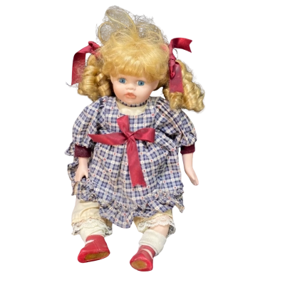 Homeart “Shelby” Porcelain Sitting Doll
