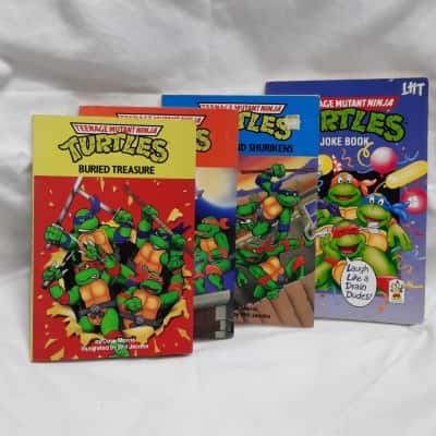 Set Of 4 Collectable TEENAGE MUTANT NINJA TURTLES Books