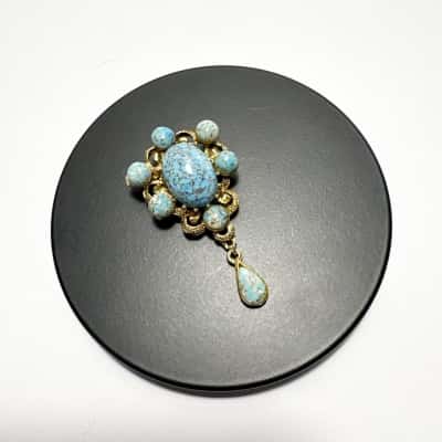   Vtg. Gold-tone Filigree Brooch features faux turquoise marbled Possibly blue Czech/Bohemian art glass cabochons and a teardrop dangle charm