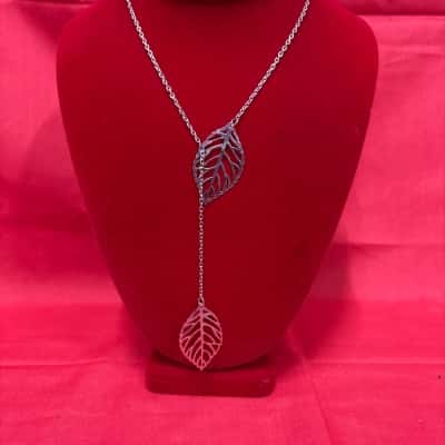 Women's Silver Tone Lariat Necklace featuring 2 Intricate Cut Out Leaf Shape Charms