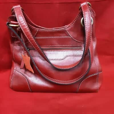Colorado Women's  deep red handbag with multi compartment