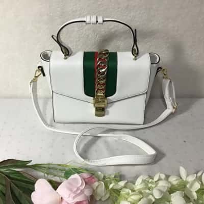 Le Compagnon Womens White Handbag with Green & Red Stripe Gold Chain Detail 