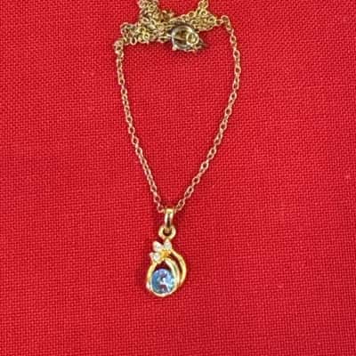  Women's Gold Tone Necklace with a Blue Stone & Diamante Pendant