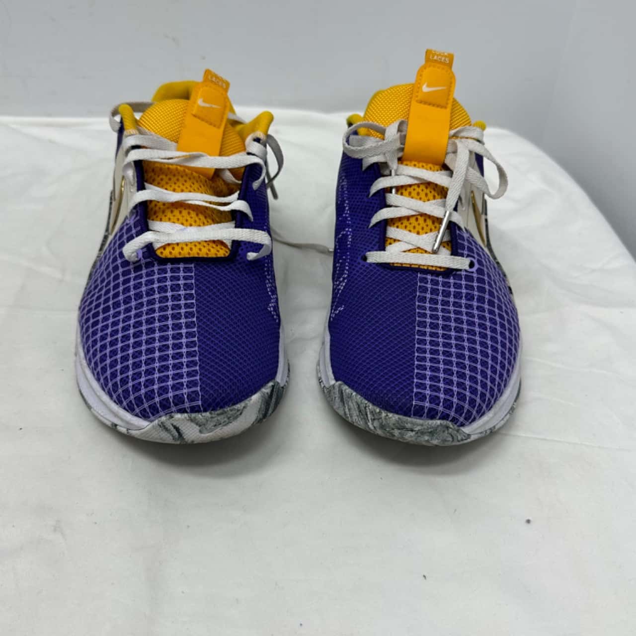 nike react purple and yellow
