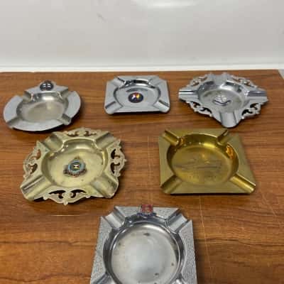 Silver and gold toned nautical themed ash trays
