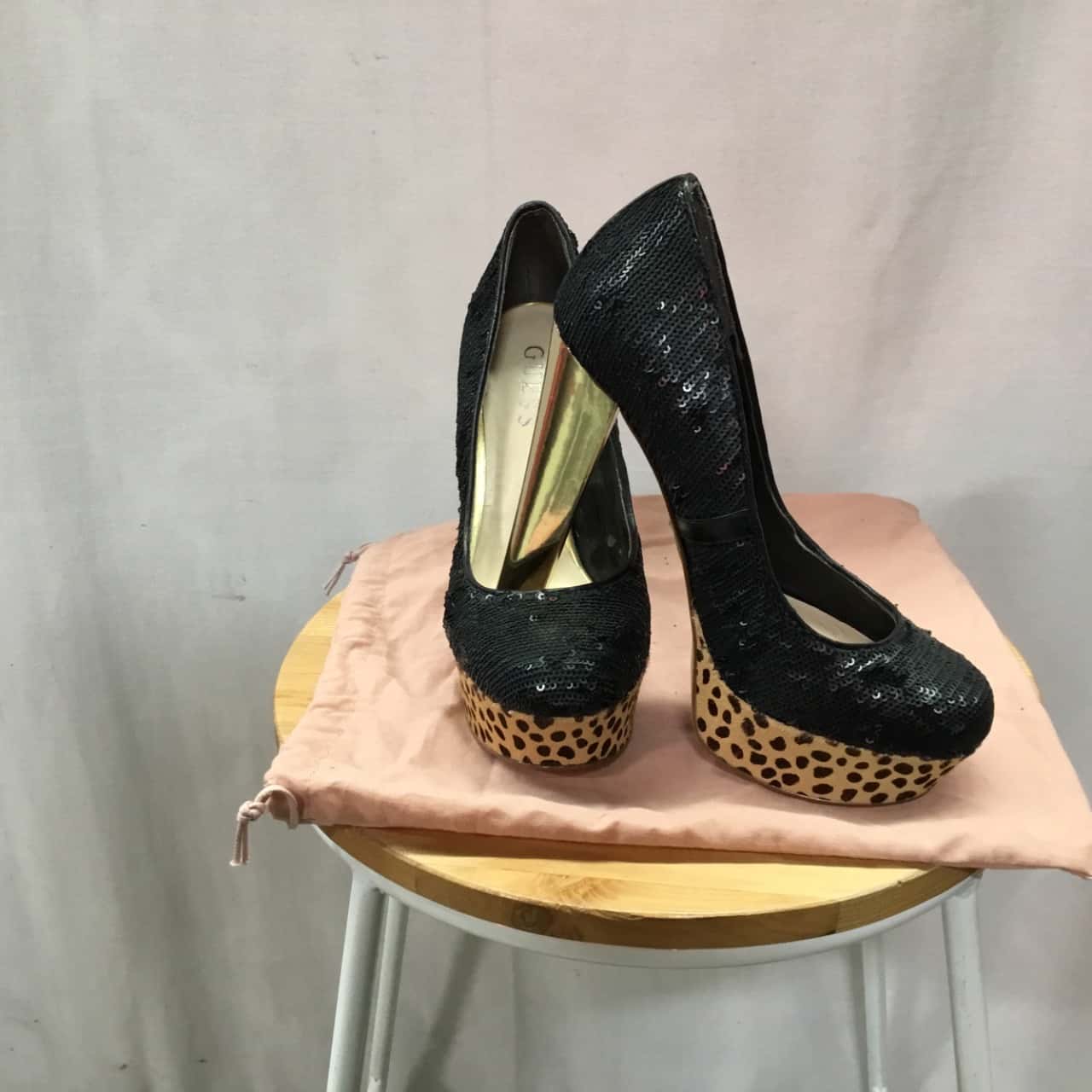 guess black and gold shoes