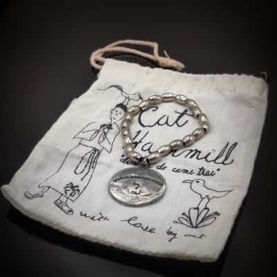 Excellent Condition Elasticated Silver Bead Bracelet Featuring Coin Drop "Wisdom Outweighs Wealth" In Original Cat Hammill Bag