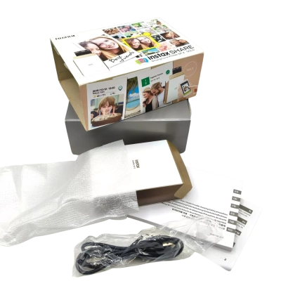 Fuji Instax Share Smartphone Printer SP-2 Includes USB Charging Cable, Rechargeable Battery & Instruction Booklet. Not Tested.