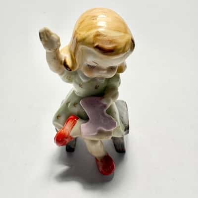 Vtg. Mid Century ceramic Young Girl figurine sitting on a Chair