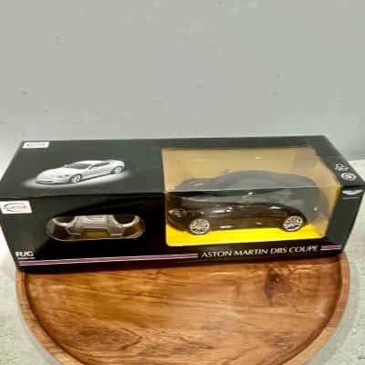 BNWOT Rastar Black Remote Control Astin Martin DBS Midel Car in Original Box 