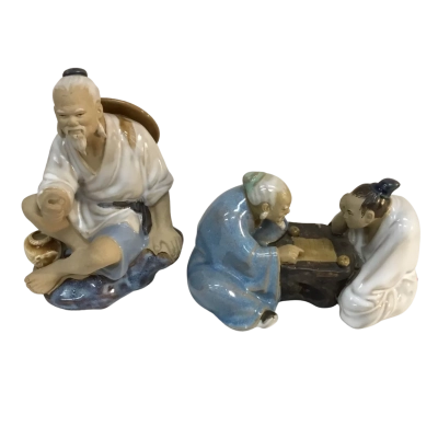 Figurines x 2 .. 1 is missing Fishing Pole 