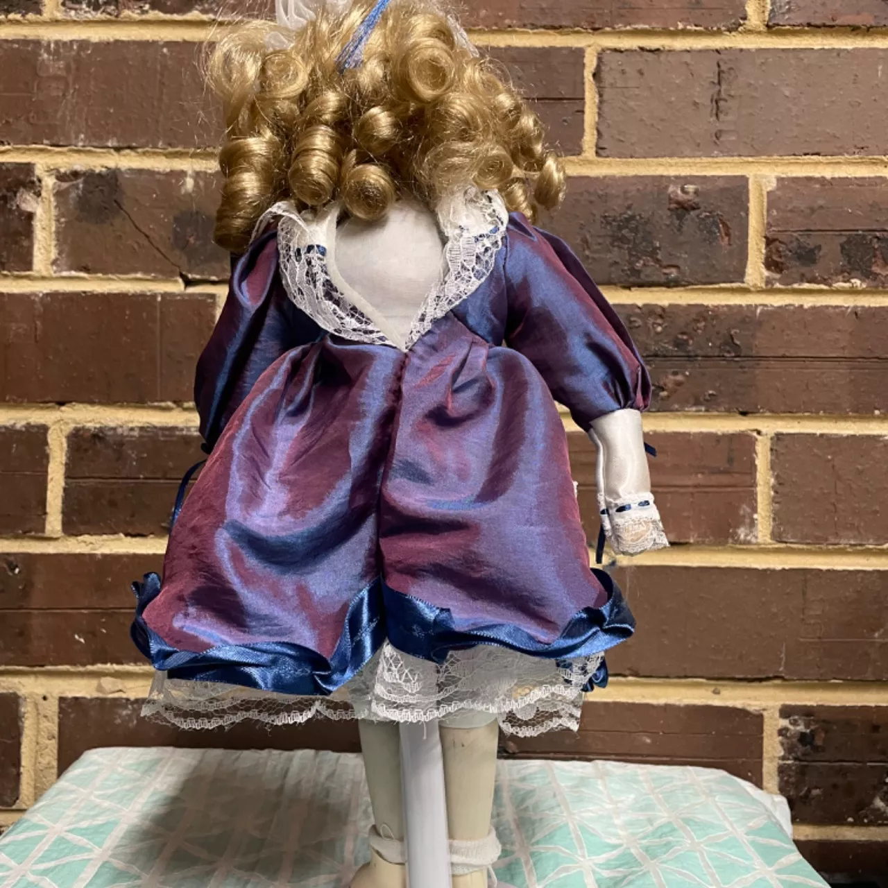 Vintage Porcelain Doll On Stand With Blue/Purple Dress - Used Very Good | Salvos Stores Vintage Porcelain Doll On Stand With Blue/Purple Dress - Used Very Good | Salvos Stores