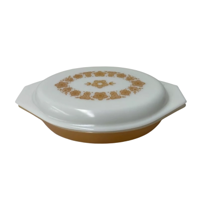 Pyrex oval gold dish with lid in good order