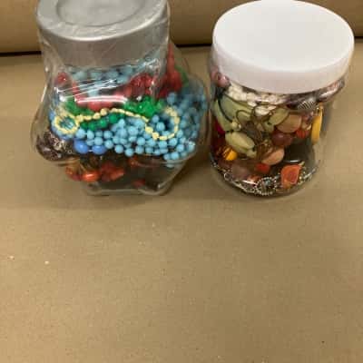 Two fantastic jars of beads and necklaces and bits & pieces for craft