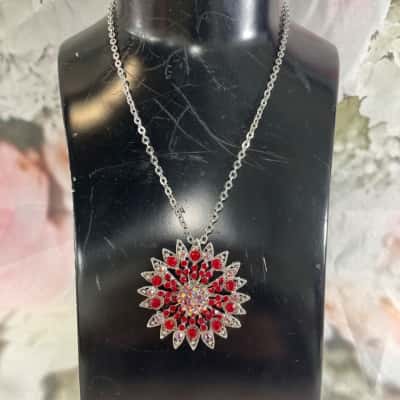 Starburst Pendant on Silver Toned Chain 