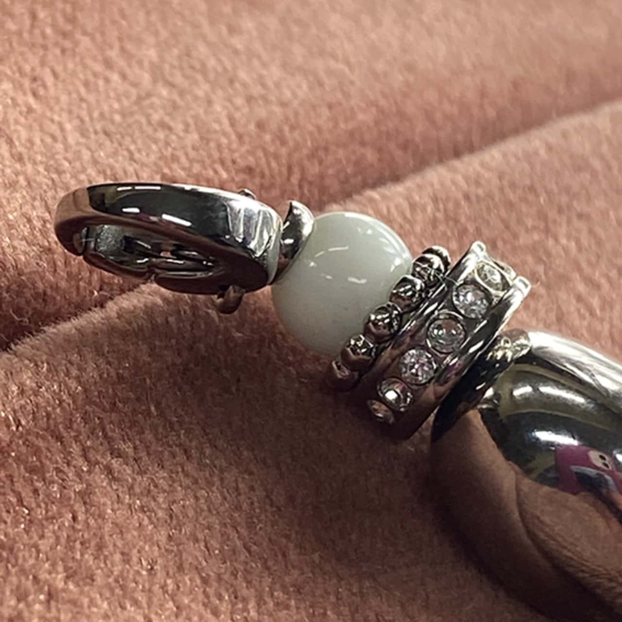 Fossil charm in steel. For bag, purse, keys etc(s)