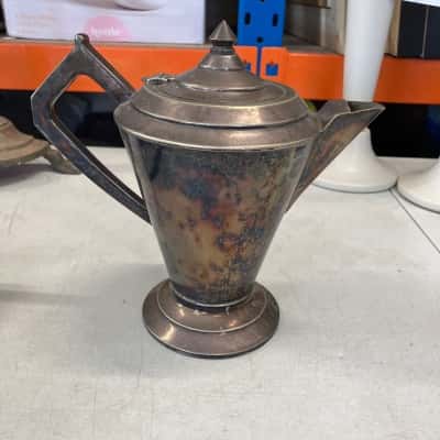 Vintage tarnished silver-soldered teapot