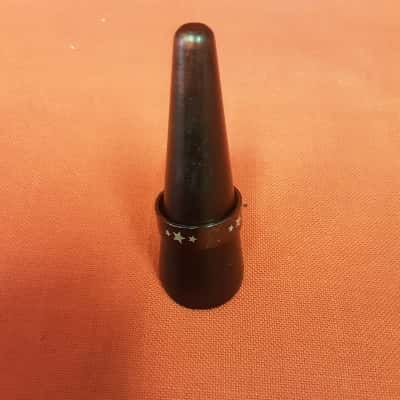 Black stainless steel band ring featuring a star pattern