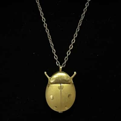 Cycle Antimagnetic Gold Toned Lady Bug Necklace Watch Pendant