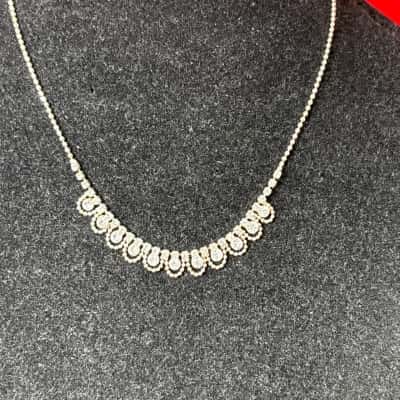  Women's Silver Tone Metal Chain Necklace featuring a U Shaped Statement Drop Design 