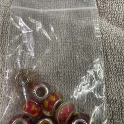Womens  8 assorted  red silver beads 