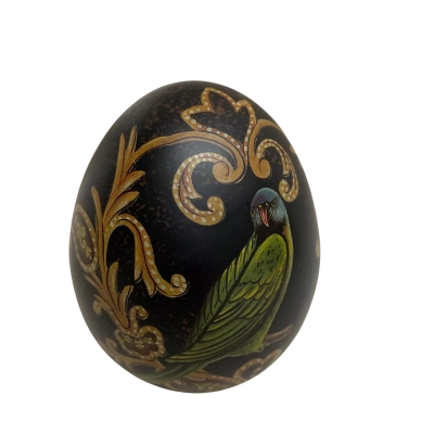 Decorative painted egg features a Parrot