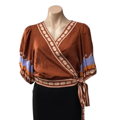Womens approx Size S / M Burnt Orange Wave Pattern Wrap Around Short Sleeve Top