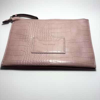   Tony Bianco pale pink clutch featuring a crocodile-embossed "leather-look" finish