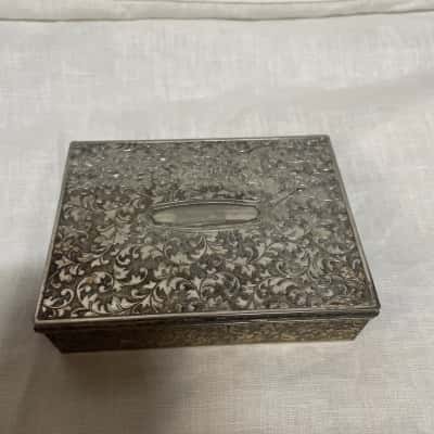 Metal cigarette/trinket box