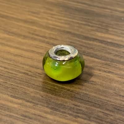  Women's lime green bead , stamped 325 silver.