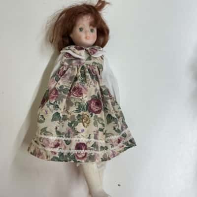 vintage style doll with stand