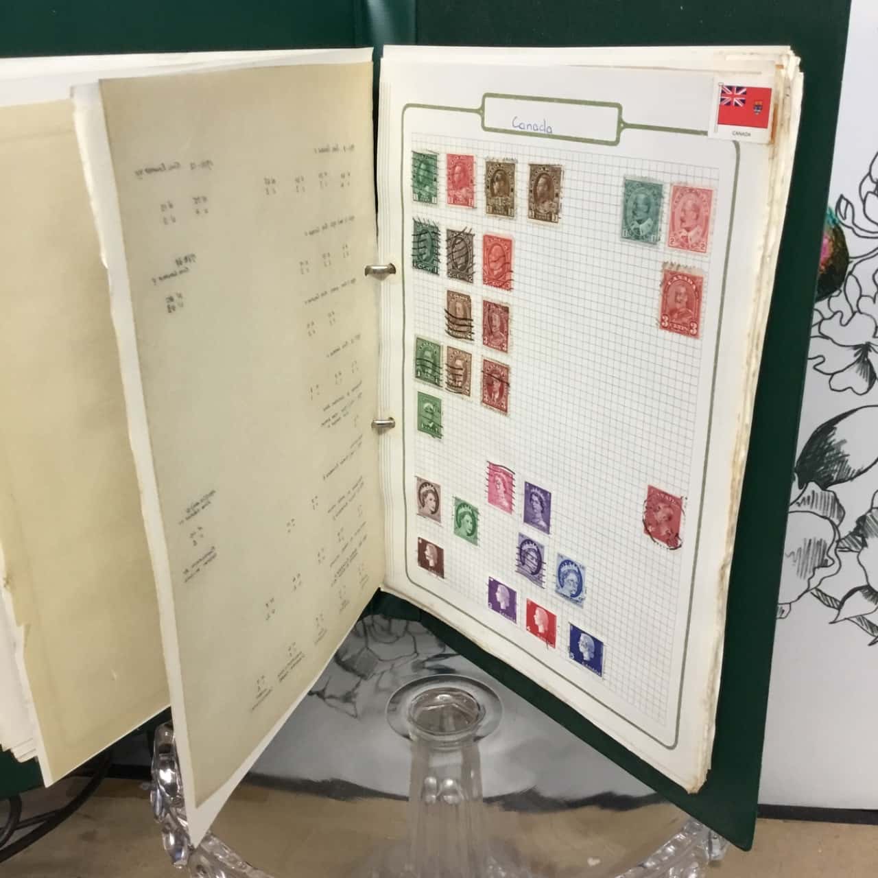 stamp collection in green binder (s)