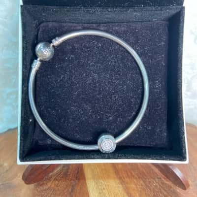 Pandora Moments Bangle with cubic zirconia sparkling logo clip charm 