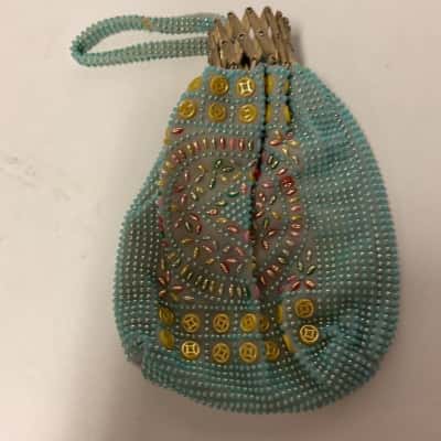 Vintage cloth beggars bag with expandable  metal opening 
