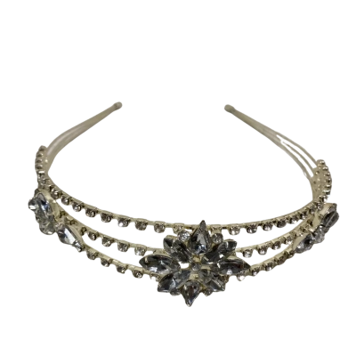 rhinestone headband features a silver gray, triple-band design adorned with a prominent vintage-style brooch